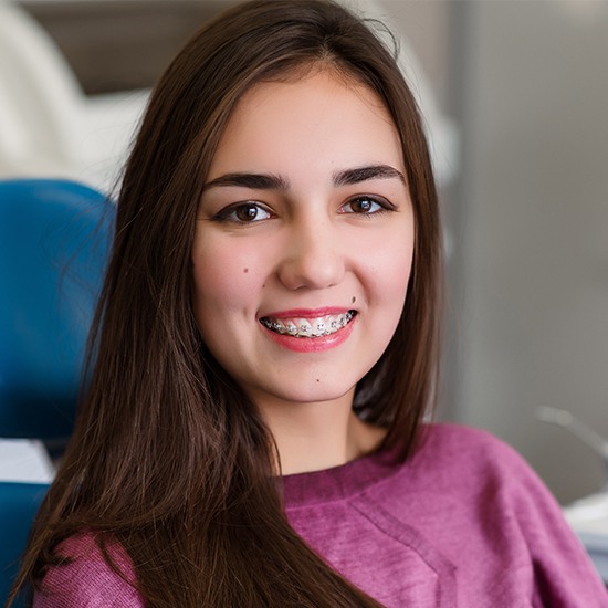 Smiling teen with braces