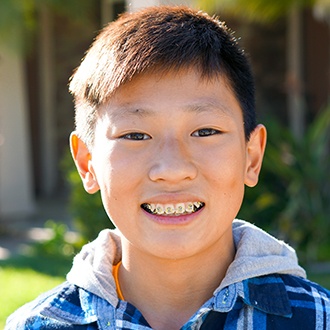 Smiling teen with braces
