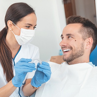 Patient with Invisalign smiling at Milton orthodontist