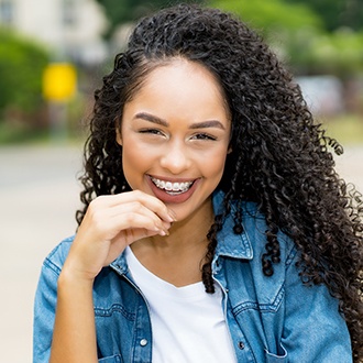 Smiling woman with braces